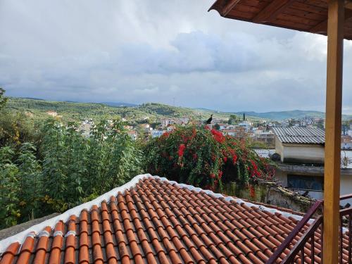 a view of a city from the roof of a house at Cozy Stone House in Central Zacharo - Near Beach in Zakharo
