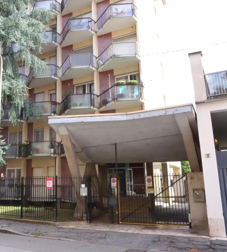 an external view of an apartment building with a balcony at Valeria Apartment in Monza