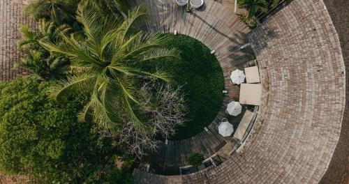 an overhead view of a road with palm trees at The Dewa Koh Chang in Ko Chang