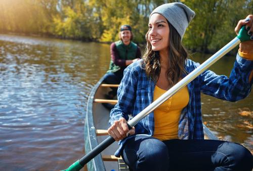 a group of people on a boat on the water at Gyulai Camping en Resort in Gyula