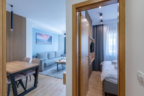 Giường trong phòng chung tại The Forest Club Spa & Apartments