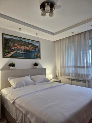 Katil atau katil-katil dalam bilik di Mika's Apartment - comfort and style in Oradea