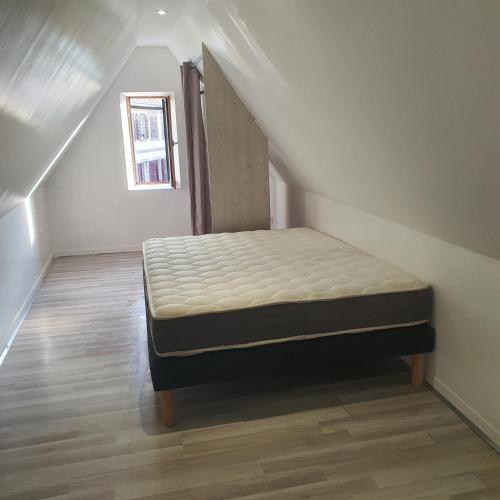 Una cama o camas en una habitación de Studio atypique avec superbe vue