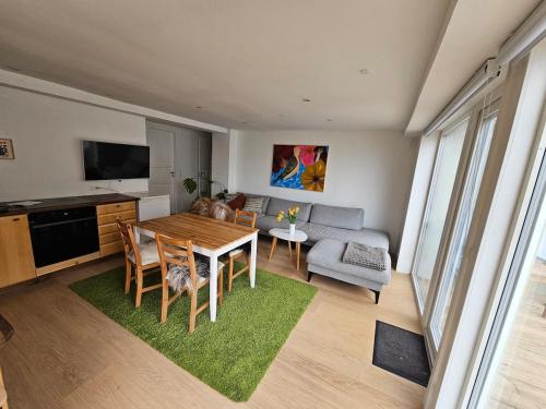 TV a/nebo společenská místnost v ubytování Sea View Suite