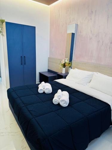 Ένα ή περισσότερα κρεβάτια σε δωμάτιο στο Blue Seagull Guest House