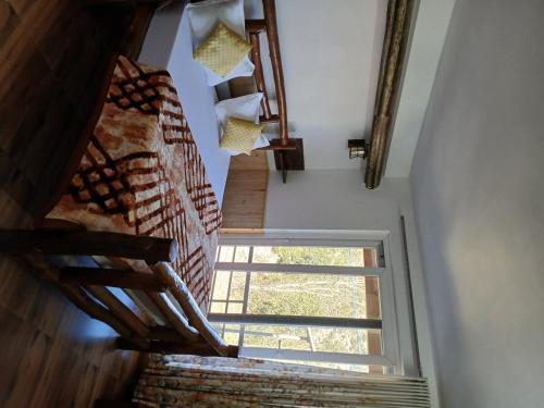 En eller flere senge i et værelse på Himdarshan view cottage