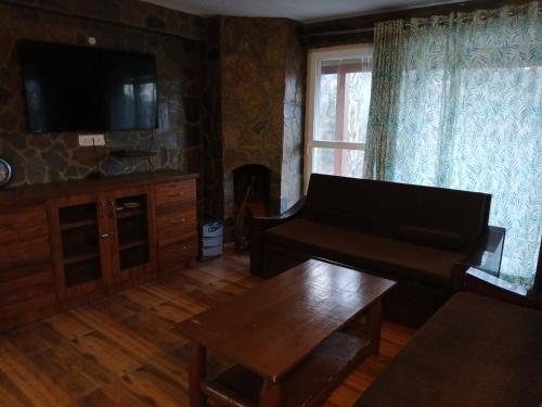 Et opholdsområde på Himdarshan view cottage