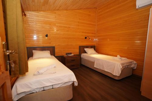 Postel nebo postele na pokoji v ubytování Cirali Hotel