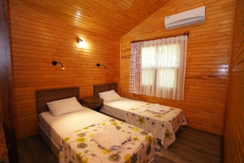 Postel nebo postele na pokoji v ubytování Cirali Hotel