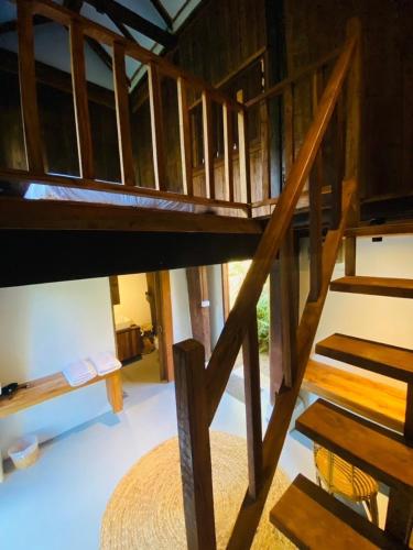 a large wooden bunk bed in a room at NernJamsai in Sop Poeng
