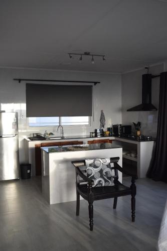 Una cocina o cocineta en Wild Vanilla Apartment
