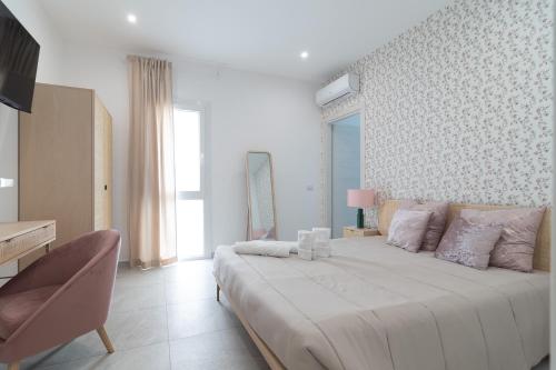 Postel nebo postele na pokoji v ubytování Residenze Miao