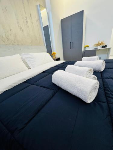 Ένα ή περισσότερα κρεβάτια σε δωμάτιο στο Blue Seagull Guest House