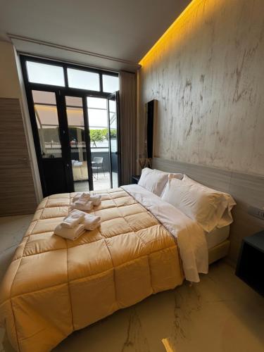Ένα ή περισσότερα κρεβάτια σε δωμάτιο στο Blue Seagull Guest House