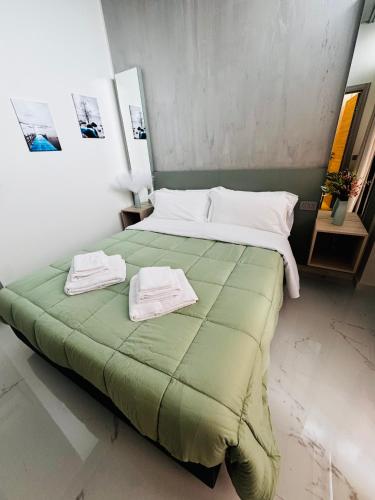 Ένα ή περισσότερα κρεβάτια σε δωμάτιο στο Blue Seagull Guest House