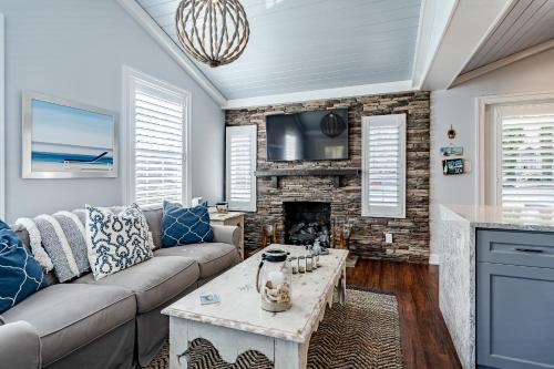 a living room with a couch and a fireplace at Renovated 3-Bedroom, 2-Bath Home in Ocean Pines Peaceful Retreat Near Ocean City in Berlin