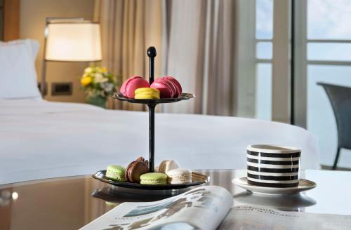 a tray of food on a table in a hotel room at The Vista At Hilton Tel Aviv in Tel Aviv