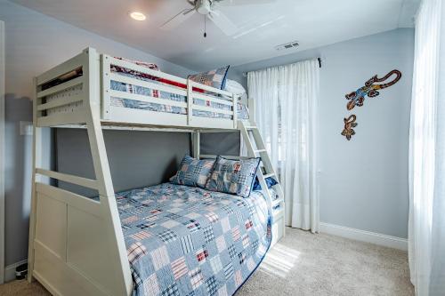 a bedroom with a bunk bed with a ladder at Renovated 3-Bedroom, 2-Bath Home in Ocean Pines Peaceful Retreat Near Ocean City in Berlin