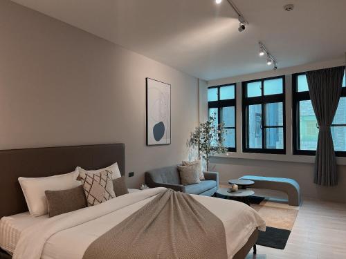 Postel nebo postele na pokoji v ubytování Minilove Homestay