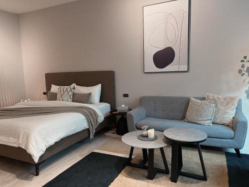 Ένα ή περισσότερα κρεβάτια σε δωμάτιο στο Minilove Homestay