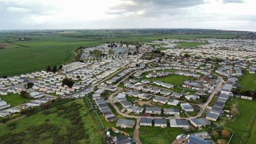 an aerial view of a park full of houses at Cozy Caravan Retreat in Saint Osyth