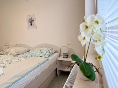 Ένα ή περισσότερα κρεβάτια σε δωμάτιο στο Guest house Kobal