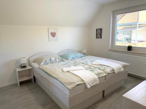 Ένα ή περισσότερα κρεβάτια σε δωμάτιο στο Guest house Kobal