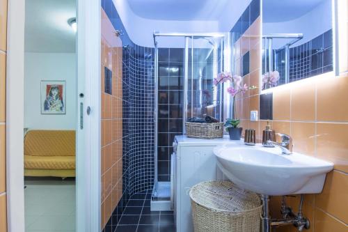 a bathroom with a sink and a shower at Italian Experience-Villa Monte Gabberi in Pietrasanta
