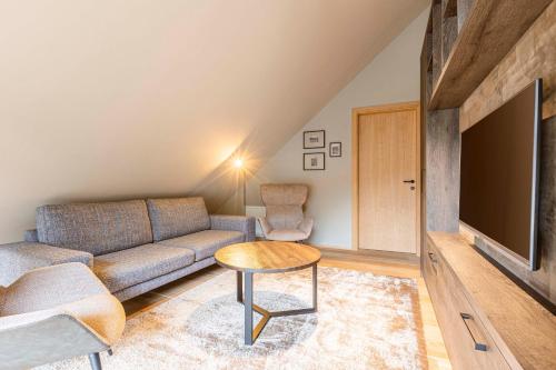 Zona de estar de Montafon Suites Schruns by ALPS RESORTS