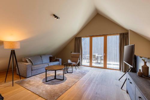 Zona de estar de Montafon Suites Schruns by ALPS RESORTS