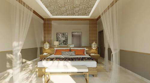 a bedroom with a bed and a coffered ceiling at Diamonds Bijoux in Bwejuu