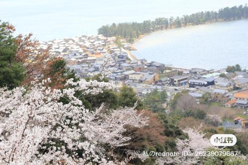 a town on the shore of a body of water at KYOTO TANGO MIYAZU inn in Miyazu