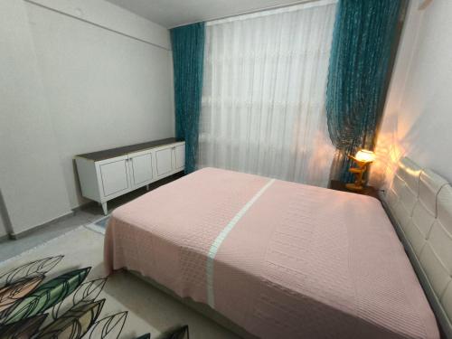Katil atau katil-katil dalam bilik di Soem Elaia House