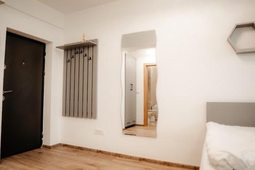 Ένα ή περισσότερα κρεβάτια σε δωμάτιο στο Nips apartament