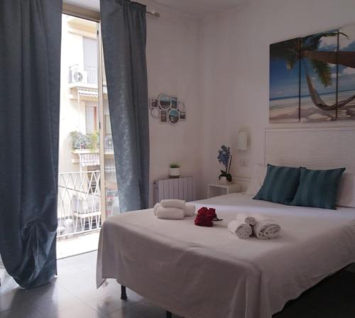 Postel nebo postele na pokoji v ubytování Hotel Birillo