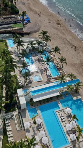 an aerial view of a resort with a beach at Harbor 171 Ocean Front Residents in Puerto Vallarta