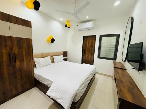Katil atau katil-katil dalam bilik di Hotel Bhole Shankar & Restaurant