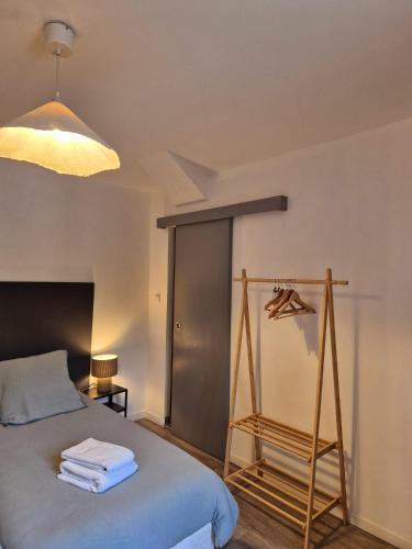 Postel nebo postele na pokoji v ubytování B&B Lily et Paul