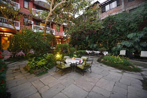 Un jardín fuera de Nirvana Boutique Hotel