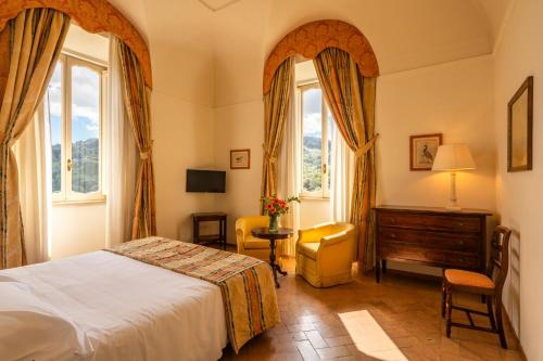 Postel nebo postele na pokoji v ubytování Park Hotel Villa Grazioli