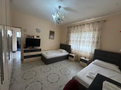 En eller flere senge i et værelse på Eri apartment