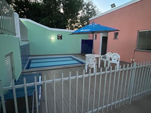 Kolam renang di atau dekat dengan Apartamento Cravo e Canela Condomínio Praias do Atlântico Clube 430