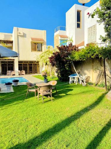 Сад в Villa Kayan in fayed