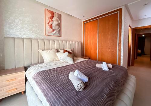 Postel nebo postele na pokoji v ubytování Harmonie Kénitra Grand Appartement 3 Chambres Tout Confort