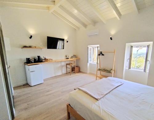Kuchyň nebo kuchyňský kout v ubytování Olive Grove boutique studio apartments