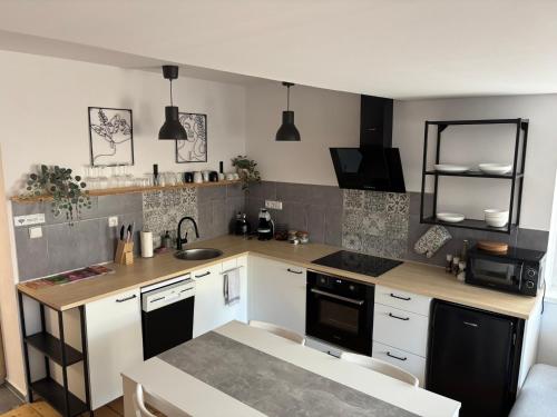 Kuchyň nebo kuchyňský kout v ubytování Apartmán 101