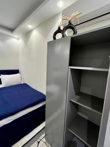 Cama o camas de una habitación en AURORA PYRAMIDS HOTELl