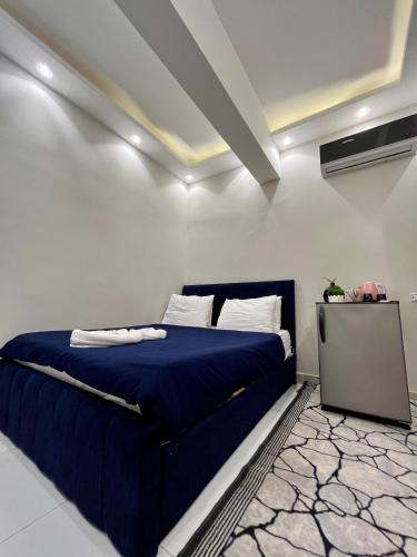 Cama o camas de una habitación en AURORA PYRAMIDS HOTELl
