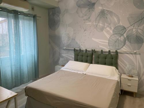 Residence B&B il Connubioにあるベッド