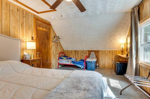 a bedroom with a bed and a desk and a window at 2 Mi to Ossipee Lake Forest-View Sanctuary! in Freedom